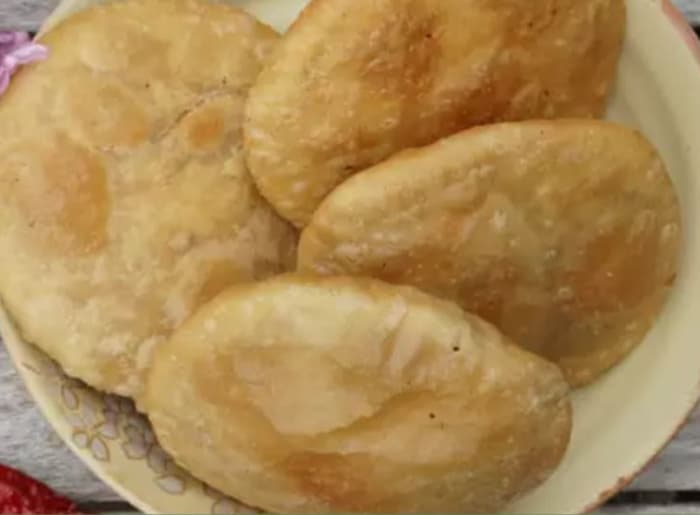 Best foods to try in Himachal Pradesh, featuring traditional Himachali dishes including Dham, Siddu, Madra, and Kullu Trout.