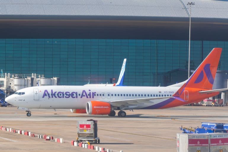 Air India Flight at an airport amid revised airline fuel surcharges