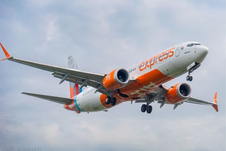 Air India Flight at an airport amid revised airline fuel surcharges