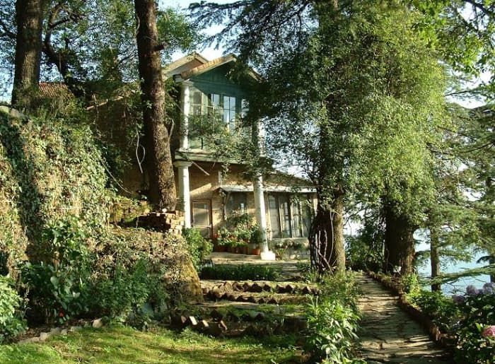 Indian homestay surrounded by mountaina and forests