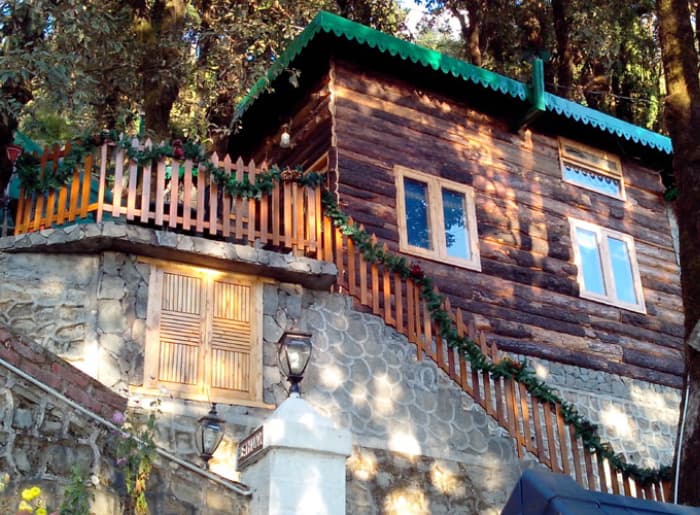 Indian homestay surrounded by mountaina and forests