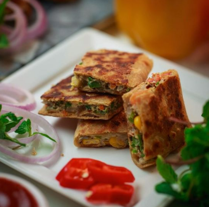 Vegetable paratha sandwiches stacked on top of each other