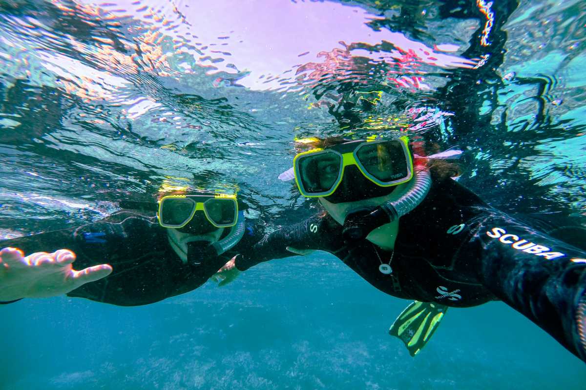 A woman and a man snorkeling