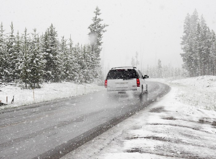 A cab on a snowy road in Gulmarg