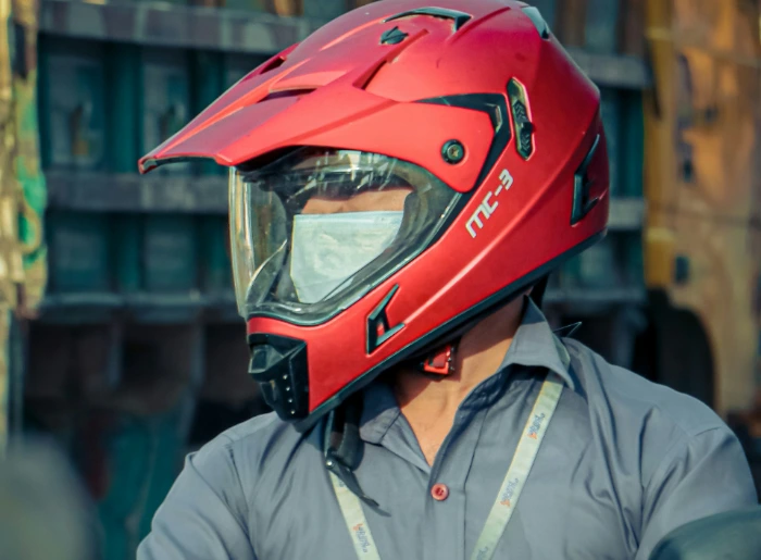 A rider with a helmet