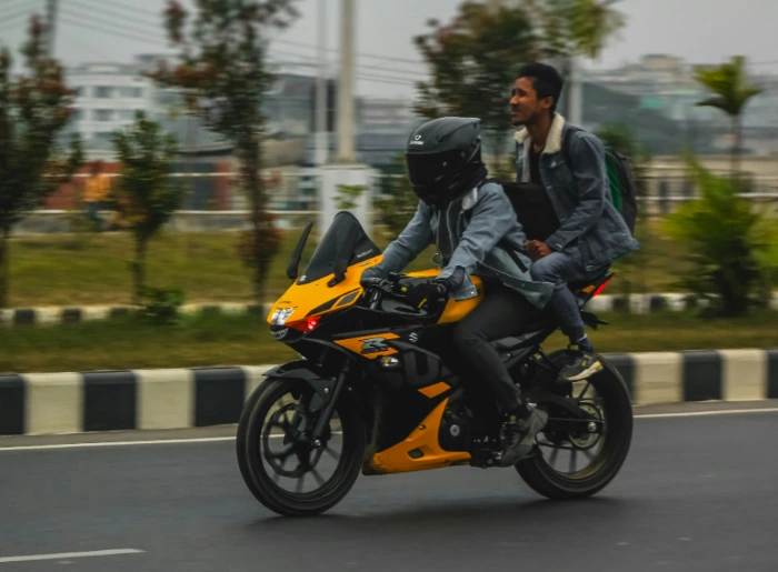 Two people on a bike