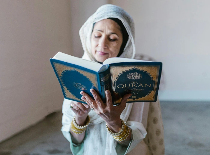 Woman reading Quran