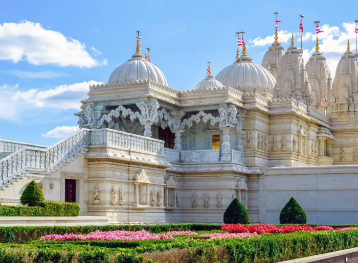 8 Spectacular BAPS Temples Around The World You Should Visit 3 BAPS Hindu temple showcasing traditional architecture and intricate carvings