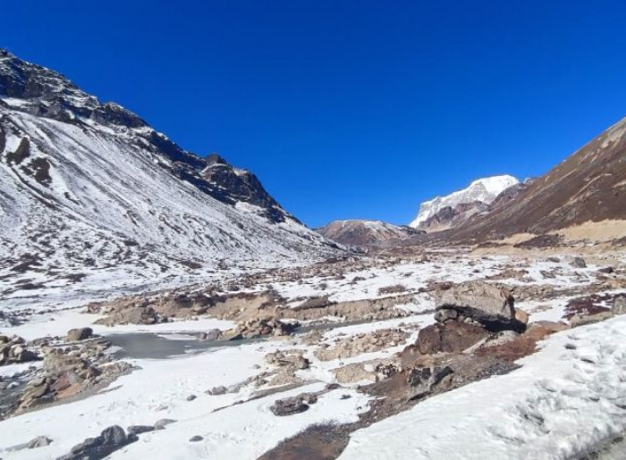 Which Destinations In North Sikkim Should Be On Your List? Here’s Are Top 10 Places To Add 2 Mountain landscape in North Sikkim surrounded by snow-covered Himalayan peaks
