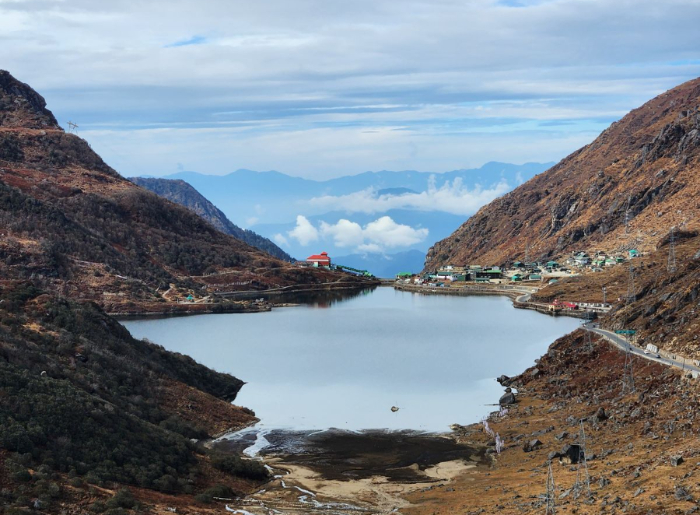 Which Destinations In North Sikkim Should Be On Your List? Here’s Are Top 10 Places To Add 5 Mountain landscape in North Sikkim surrounded by snow-covered Himalayan peaks