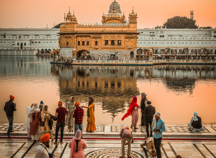 Golden Temple in Amritsar seen in morning and at night
