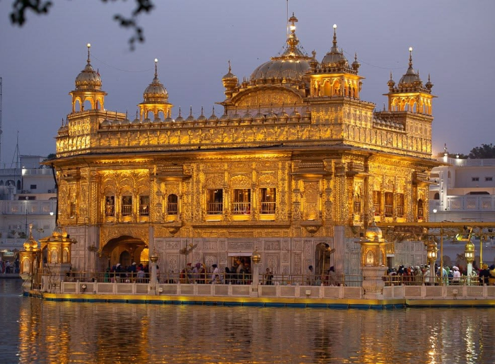 Golden Temple in Amritsar seen in morning and at night