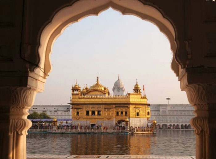 Golden Temple in Amritsar seen in morning and at night