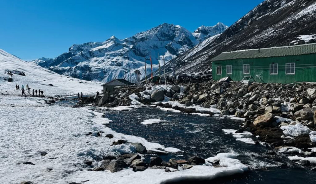 Zero Point in North Sikkim surrounded by snow-covered Himalayan mountains